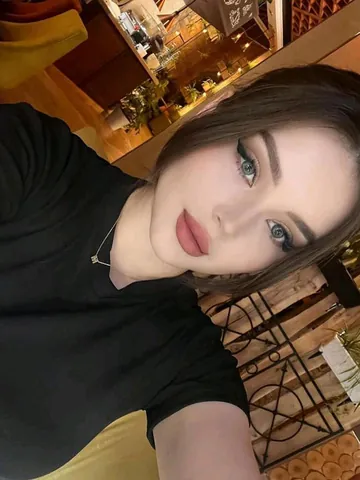 Ruby taking a selfie at home